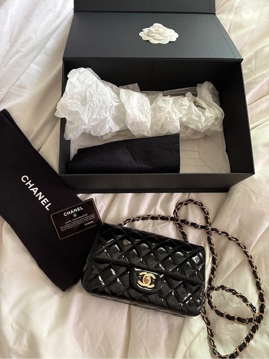 CHANEL Handbags - CHANEL Black Quilted Patent Leather Mini Crossbody with Gold-Tone Chain